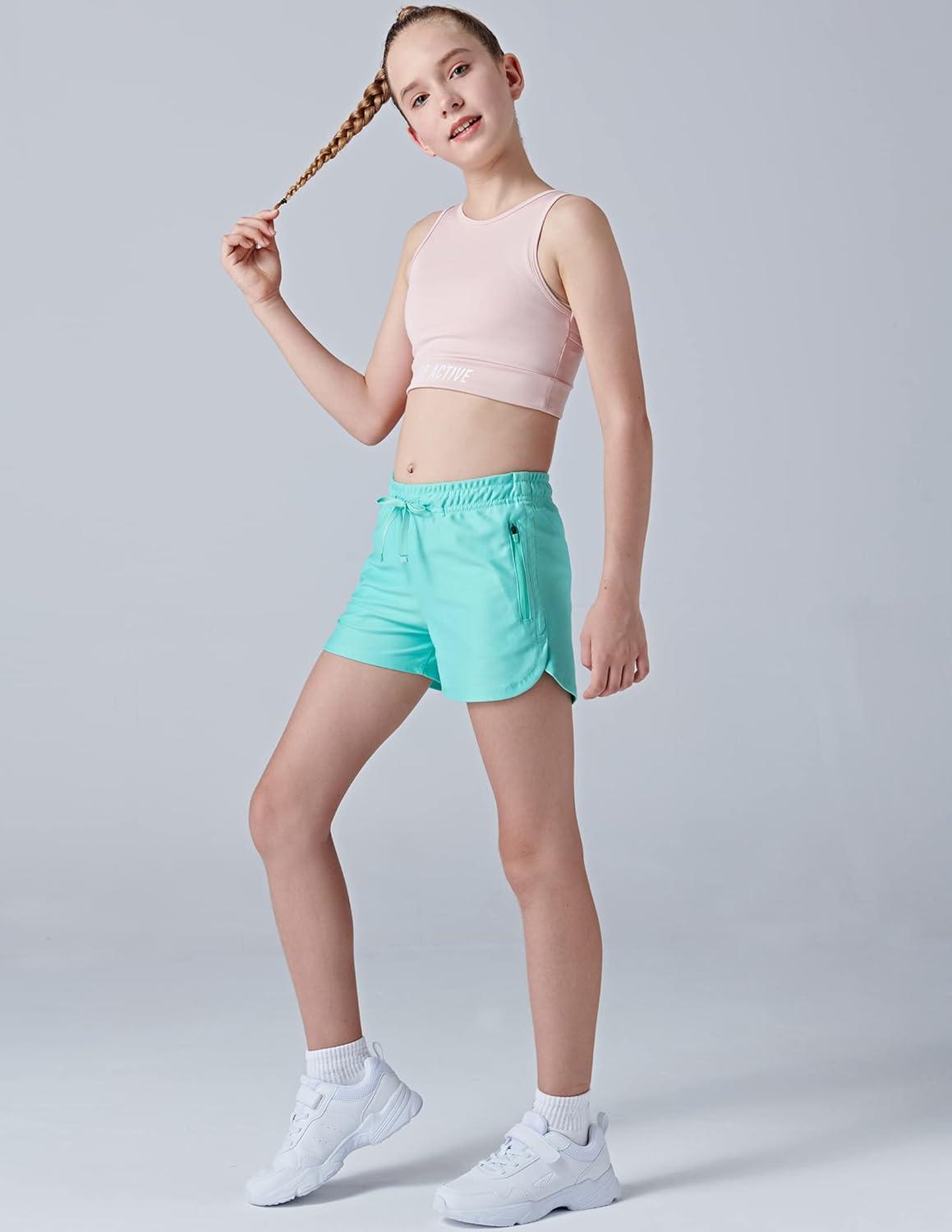 image4 Pack Youth Girls Athletic Shorts 3quot Girls Soccer Shorts Kids Workout Gym Clothes Activewear Apparel with Zipper PocketsPurpleCharcoalGreenPink