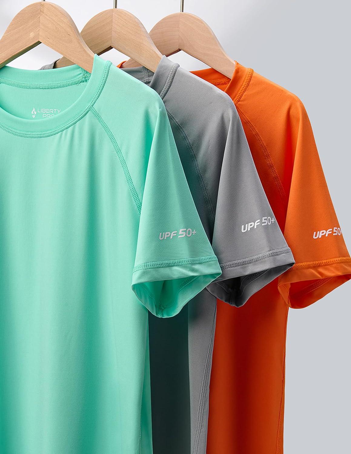 imageLiberty Pro 3 Pack Boys UPF 50 Rash Guard Short Sleeve Swim Shirts Quick Dry UV Protection Swimwear for KidsGrayLight GreenTangerine