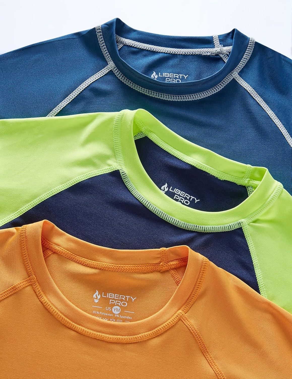 imageLiberty Pro 3 Pack Boys UPF 50 Rash Guard Short Sleeve Swim Shirts Quick Dry UV Protection Swimwear for KidsNavyOrangeDusty Blue