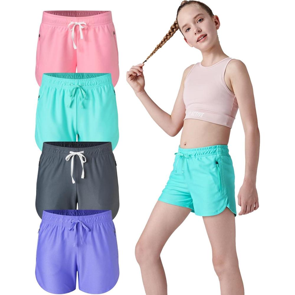 image4 Pack Youth Girls Athletic Shorts 3quot Girls Soccer Shorts Kids Workout Gym Clothes Activewear Apparel with Zipper PocketsPurpleCharcoalGreenPink