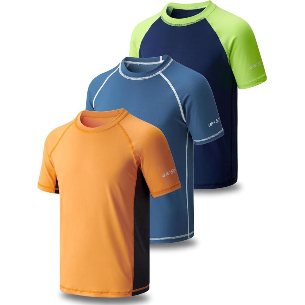 imageLiberty Pro 3 Pack Boys UPF 50 Rash Guard Short Sleeve Swim Shirts Quick Dry UV Protection Swimwear for KidsNavyOrangeDusty Blue