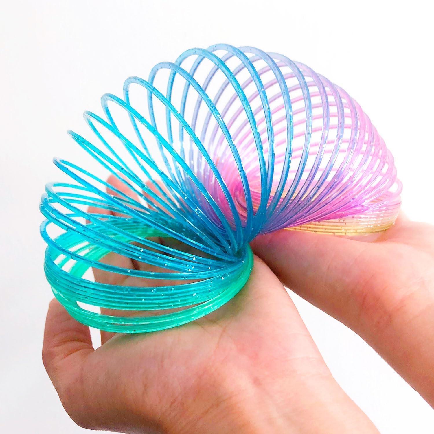 imageLiberty Imports 12 PCS Magic Rainbow Coil Springs Small Colorful Neon Plastic Bulk Toys for Kids Birthday Party Favors Goodie Bag Fillers Party Prizes 2 Inches25 Inches